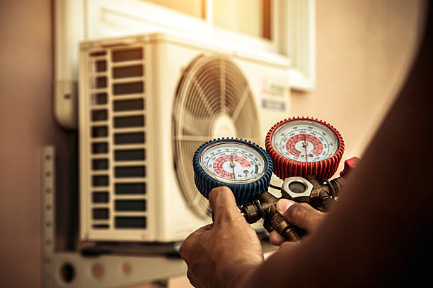 Professional Air Conditioning Service technician working in Ottawa, KS